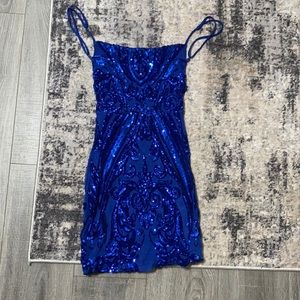 Blue sparkly Lucy in the sky dress